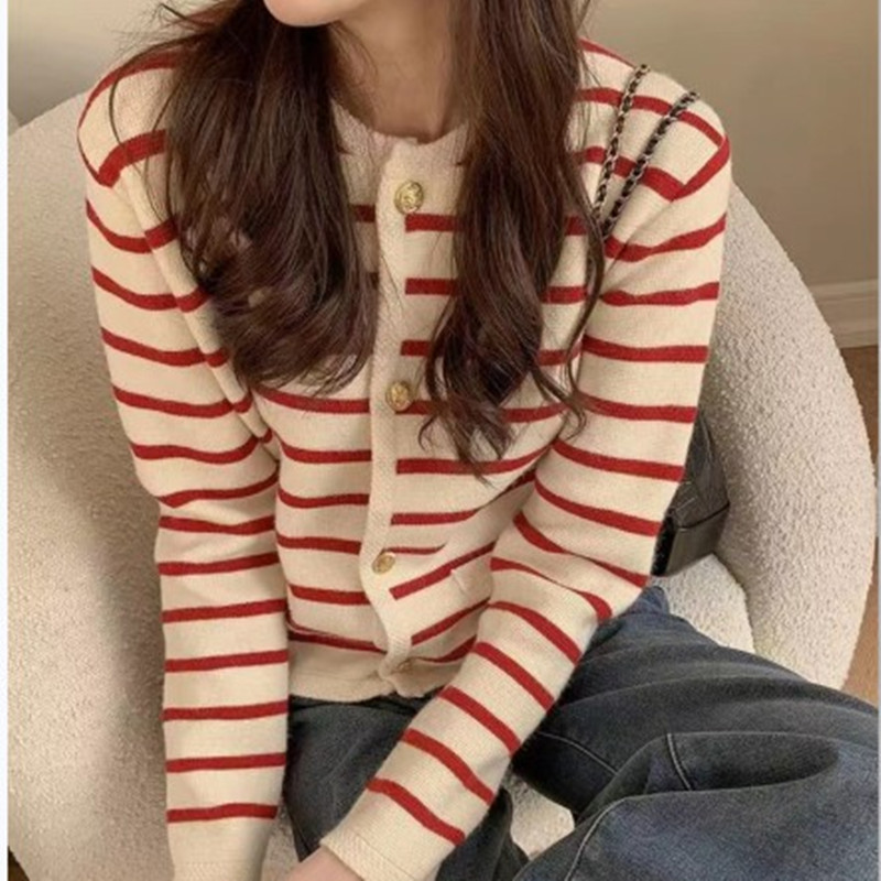 Knitted autumn cardigan with a round collar