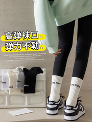 サメのズボンの靴下の女性の秋冬のストッキングの外はスポーツのレジャーを着て汗のストッキングの潮網の赤いタイプのストッキングを吸います。