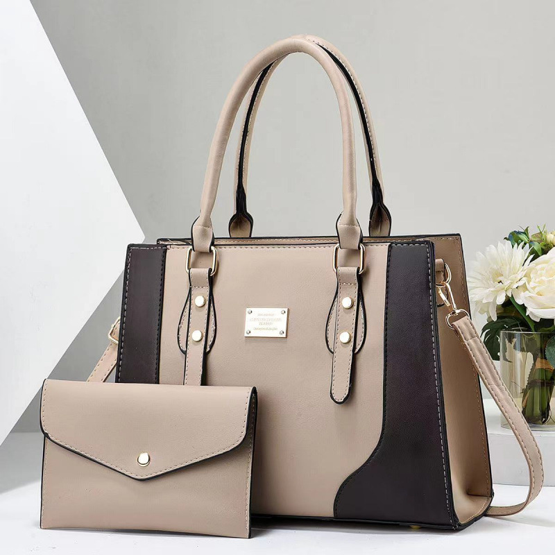Dos paquetes de bolsas de niños 2025 moda nueva mujer mochila de hombro bolsas de mano versátiles bolsas transfronterizas