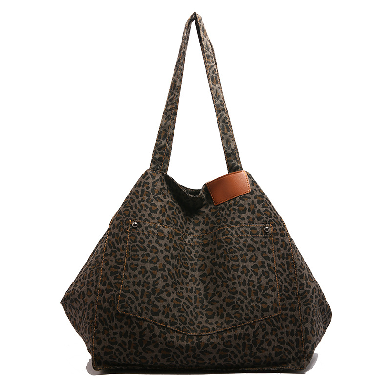 Bolso de mano de lona con estampado de leopardo de nicho Bolso de mujer Bolso de mano de moda de gran capacidad casual Bolso bandolera de estilo occidental coreano