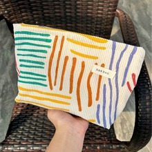 简约灯芯绒化妆包手拿便携式护肤品洗潄包大容量现货收纳花卉图案