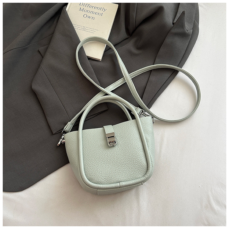Bolso de cubo para mujer, tendencia transfronteriza de alta gama, bolso de mano con patrón de lichi, viaje diario, bolsa de mensajero de canasta de verduras de estilo occidental