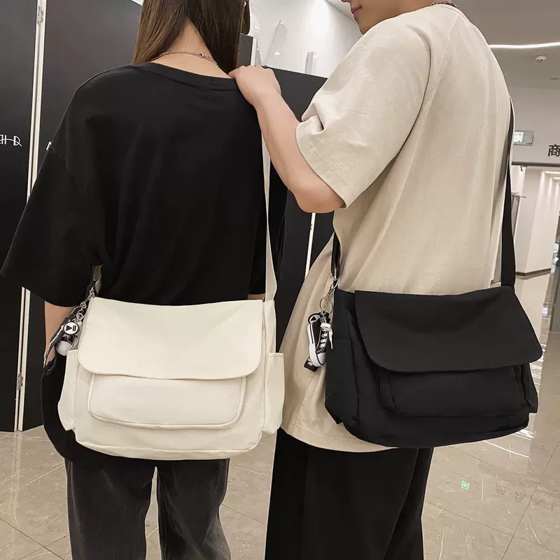 单肩包女时尚休闲邮差包韩版网红同款中学生斜挎书包百搭布袋