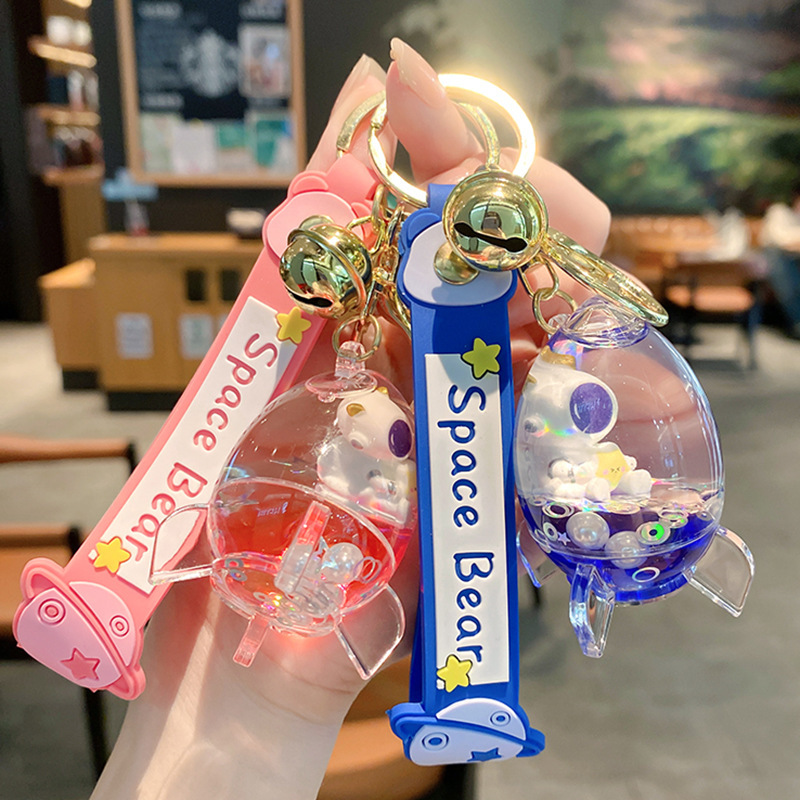 Creative oil rocket new black gold astronaut keychain drift bottle key chain schoolbag pendant small gift wholesale