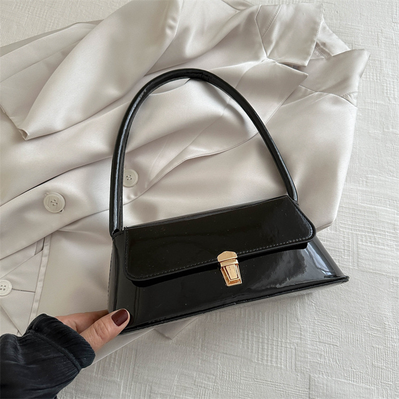 Temperamento simple bolso de hombro de bloqueo de color sólido para mujeres 2024 primavera y verano nuevo nicho de alta calidad bolso de brazo bolso de mujer