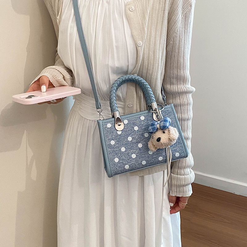 Corea del Sur Xiaozhong wave punto bolso de mano simple bolso pequeño para mujeres 2026 nueva moda versátil viaje mochila de hombro