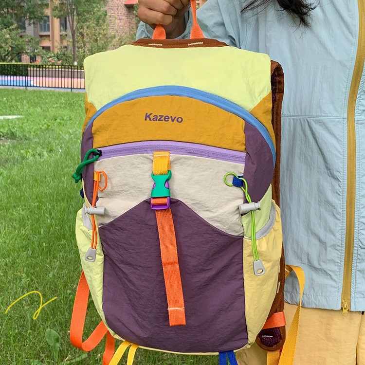 2026 early spring stylish color-blocked waterproof outdoor hiking backpack, lightweight travel backpack, trendy large-capacity backpack