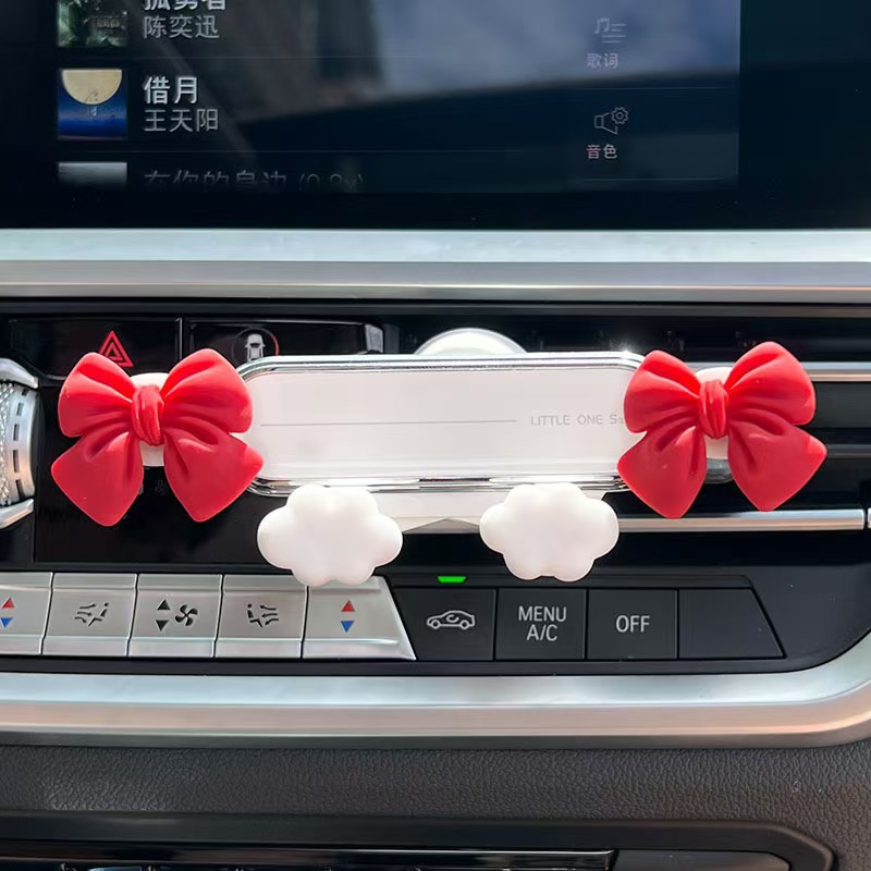 Soporte de teléfono móvil de automóvil transfronterizo, soporte de navegación de salida de aire del automóvil, arco de mariposa, artículos de decoración interior creativos del automóvil