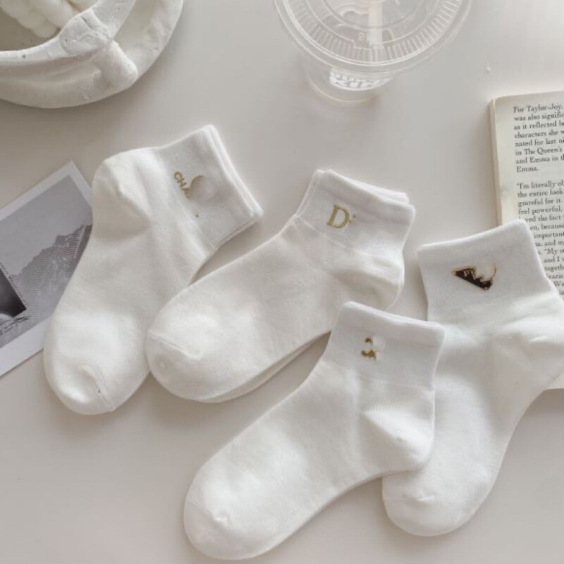 Spring and summer hot stamping short tube black and white small x logo basic socks for men and women students ins high-end light luxury tide