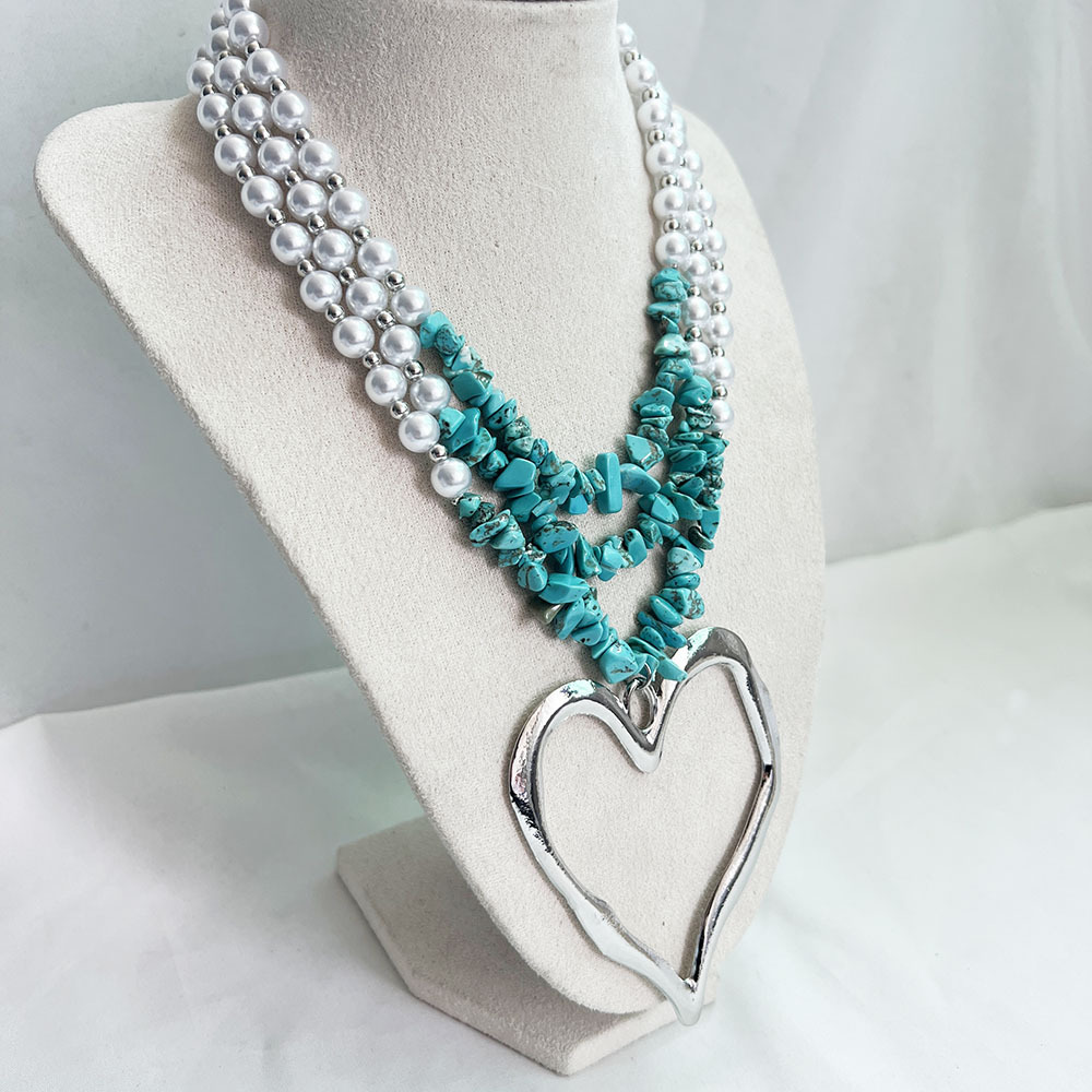 85g Weight Alloy Pendant Material Three Layer Necklace Classification Imitation Pearl Chain Material Beaded Chain Chain Type 1 Piece Quantity Casual, Party Occasion Imitation Pearl, Alloy Material Heart Shape Pattern Unisex Gender Exaggerated, Streetwear Style Exaggerated Streetwear Heart Shape Imitation Pearl Alloy Beaded Chain Statement Necklaces Wholesale 20