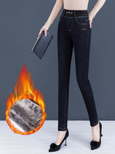 专柜加绒加厚牛仔裤女冬季松紧腰弹力修身显瘦女士一体绒保暖靴裤