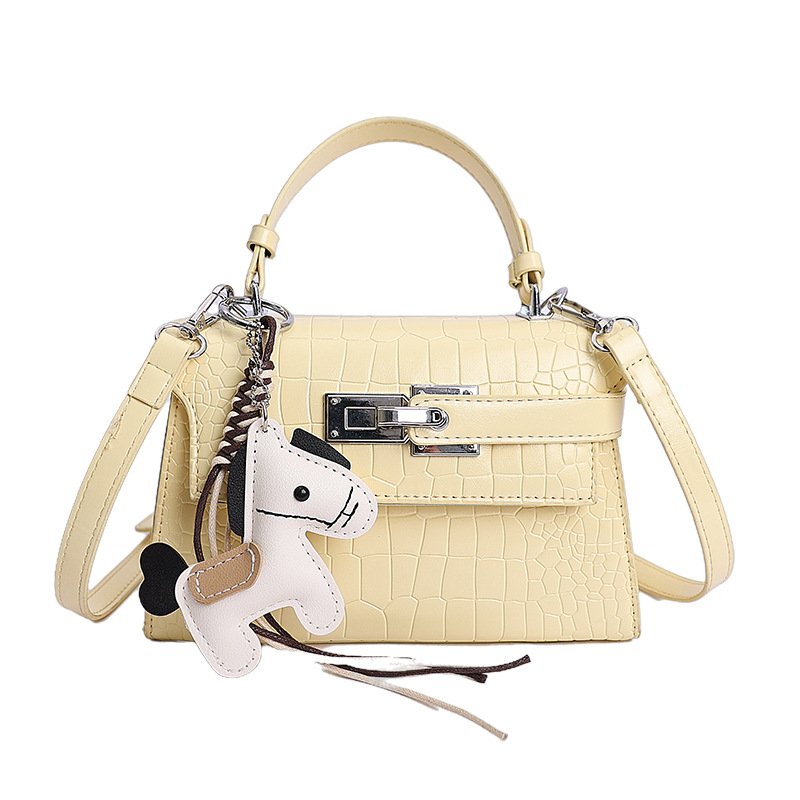 Bolsos de textura de nicho de cocodrilo de alta calidad, bolsos de mujer 2026 nuevos bolsos de mochila, bolsos de bloqueo de moda