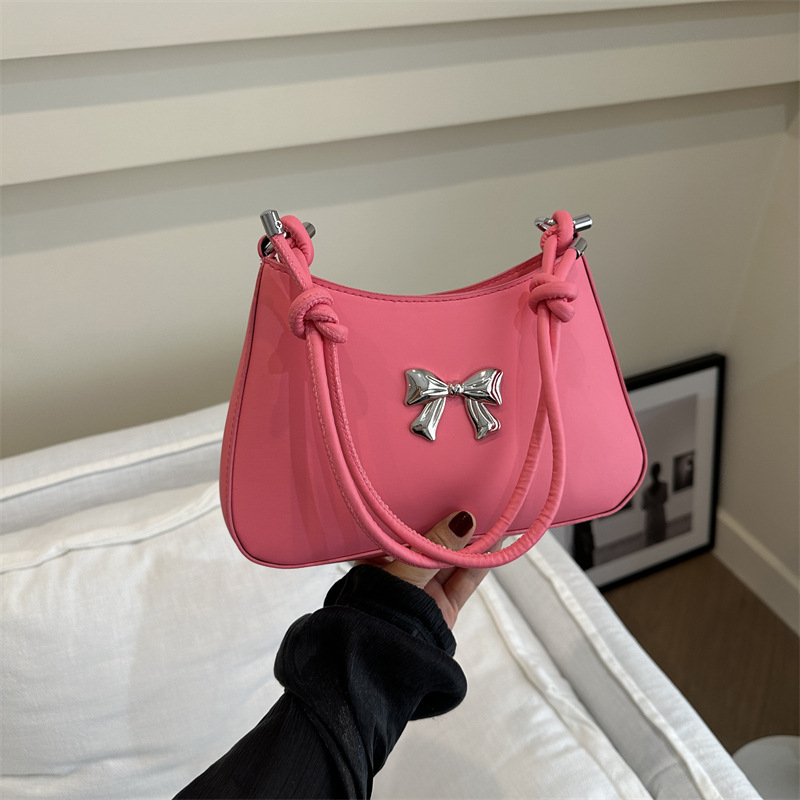 Bolso de mano de arco dulce para mujeres 2024 nueva moda coreana color caramelo brazo mochila cadena bolso de hombro