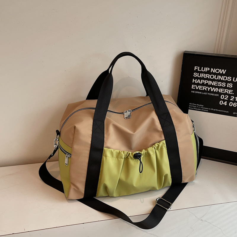 Bolsas deportivas de gran capacidad de ocio, bolsas de viaje de hombro simples de moda para mujeres, bolsas de mano ligeras de tirado.