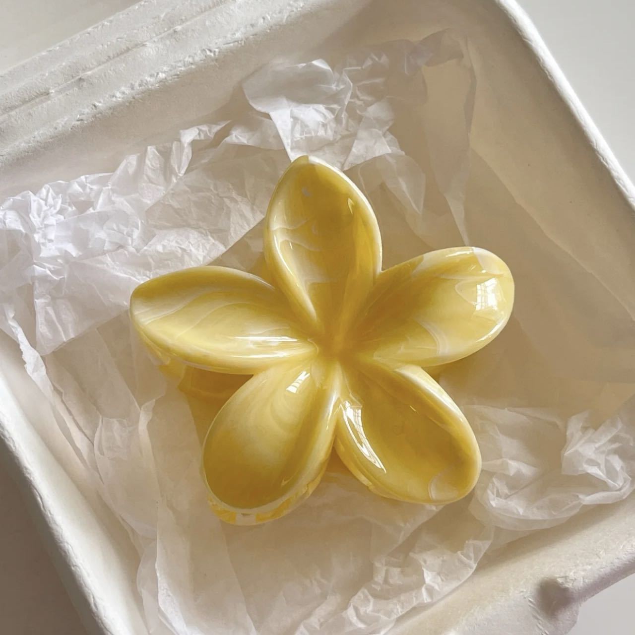 Blurred yellow plumeria