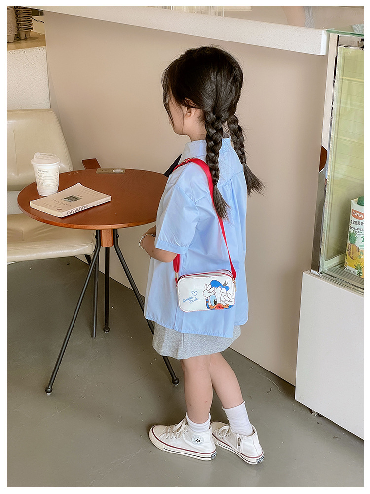 The 2025 new children's mobile phone bag is a trendy, fashionable, fresh, sweet, cartoonish, creative and simple single-shoulder crossbody bag for women undefined