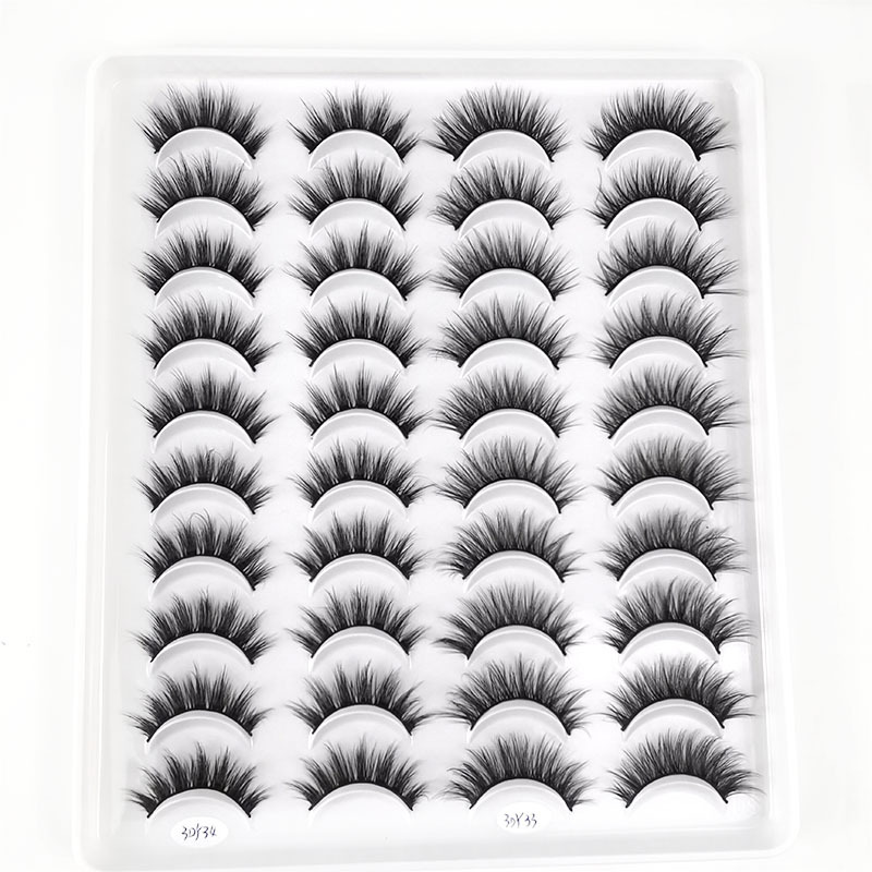 Fábrica al por mayor una caja de 20 pares de pestañas postizas 3D pestañas cortas naturales de varios niveles suministro transfronterizo europeo y americano