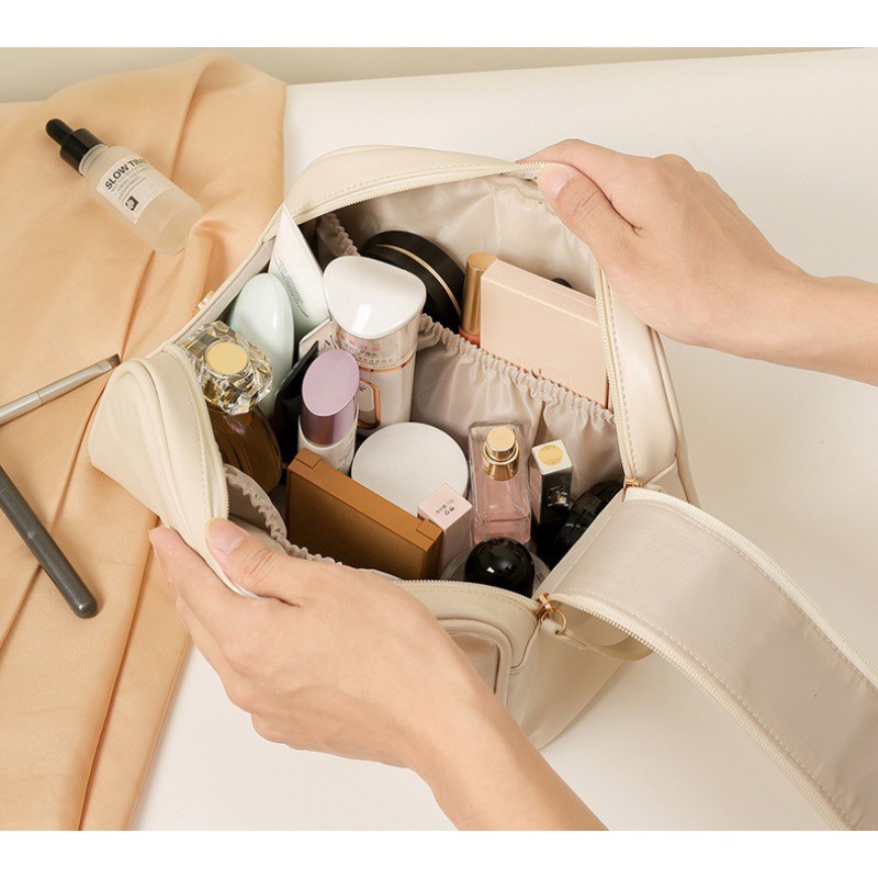 2023 Nueva celebridad de Internet PU bolsa de cosméticos de doble cremallera bolsa de lavado Portátil Bolsa de almacenamiento de cosméticos de viaje textura