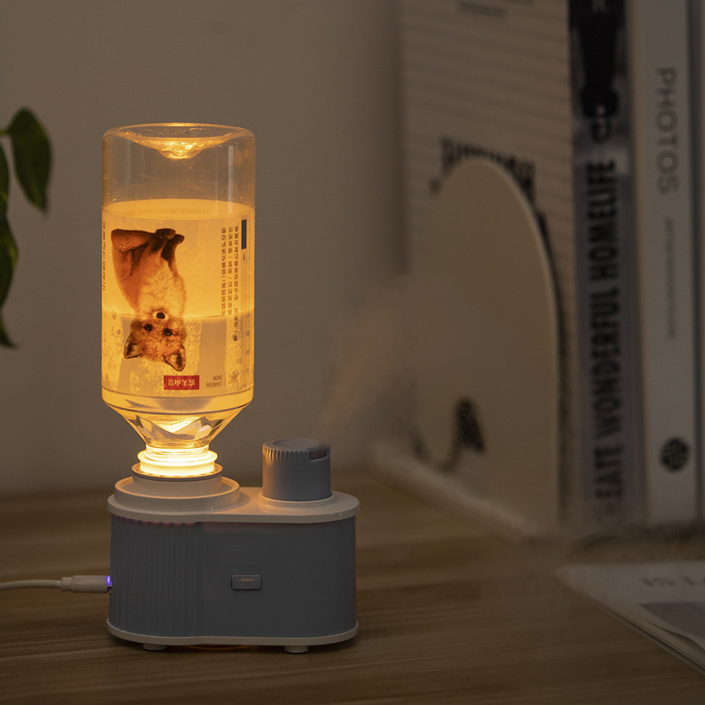 2023 nuevo aceite esencial máquina de aromaterapia hogar portátil fragancia expansor ultrasónico atomización USB botella de agua mineral máquina de aromaterapia