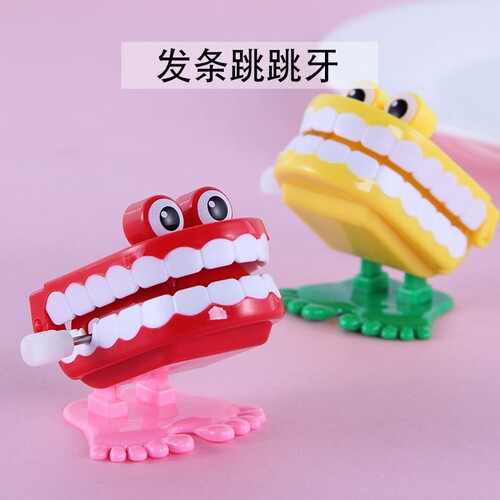 Jumping tooth clockwork winding toy jumping jumping tooth ghost tooth vampire Halloween Christmas small gift winding toy