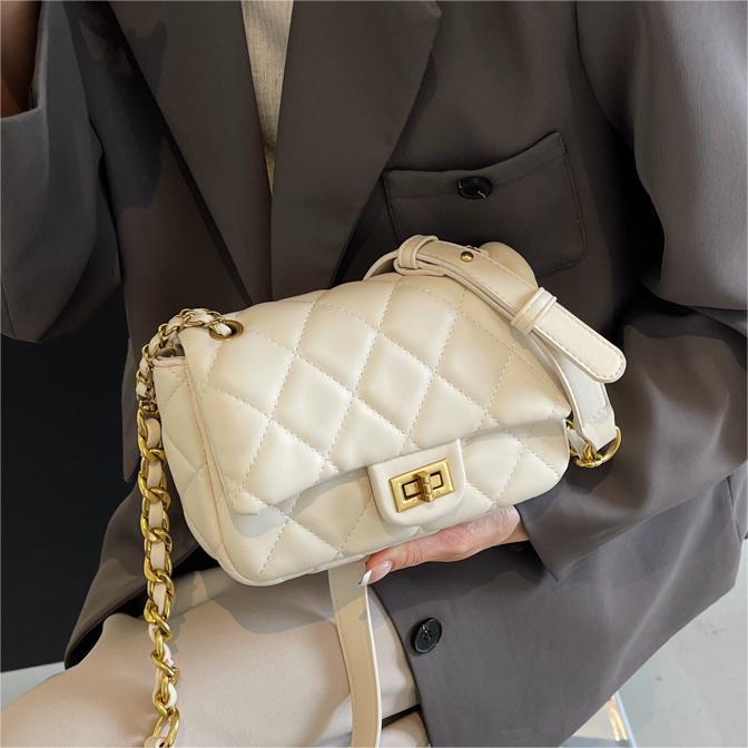 Bolsa de viento de alta calidad, dama 2024, nueva moda, bolso cuadrado de cadena de diamante, bolso de mochila de moda versátil.