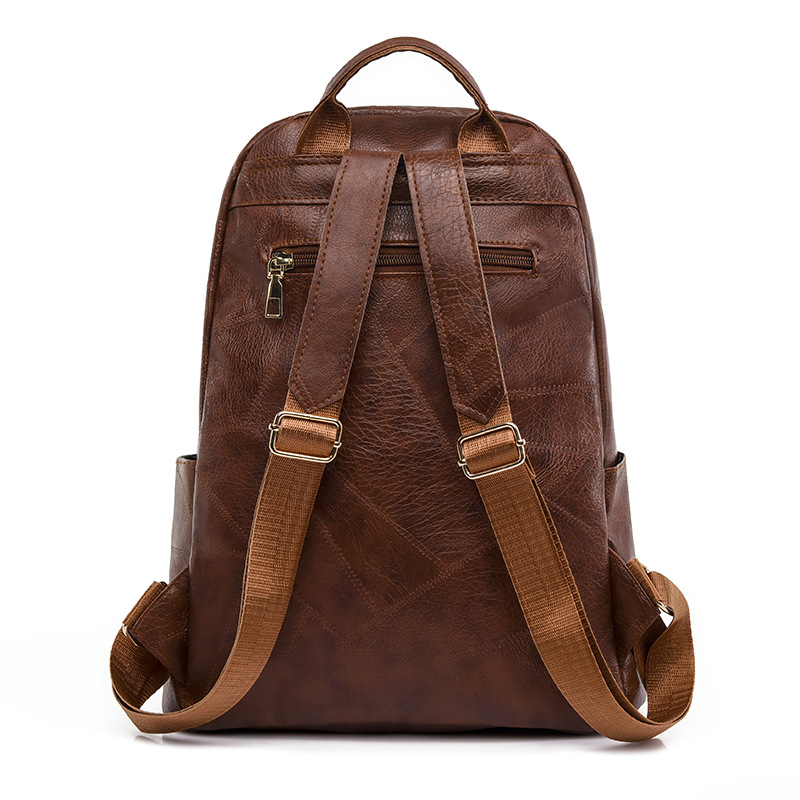 Comercio exterior al por mayor 2023 nueva mochila de PU para mujer retro simple y versátil color sólido de gran capacidad mochila para exteriores marea