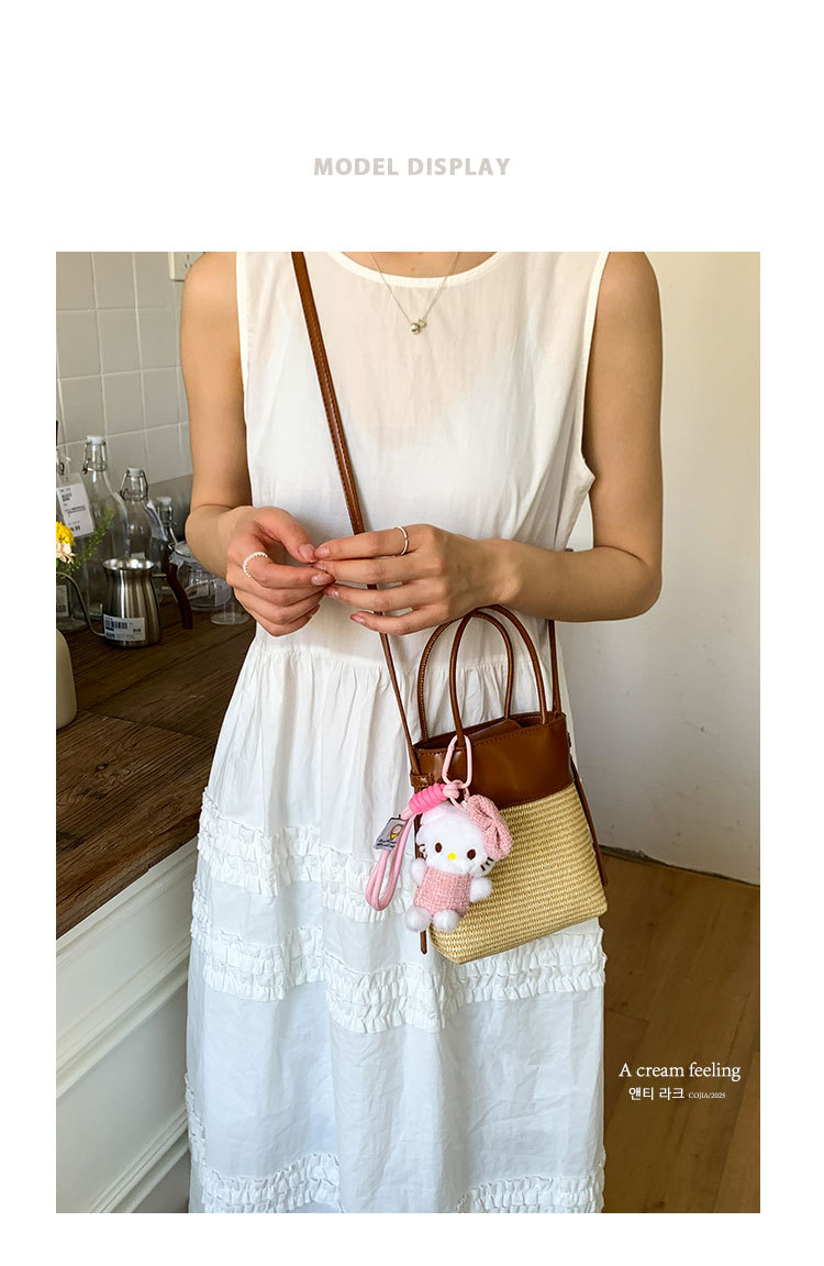 Korean style simple and fashionable woven mobile phone bag for women 2025 summer new seaside vacation crossbody straw woven bucket bag full figure