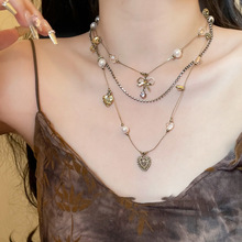 镶钻爱心三层珍珠蝴蝶结项链轻奢小众个性锁骨链中古vintage项饰