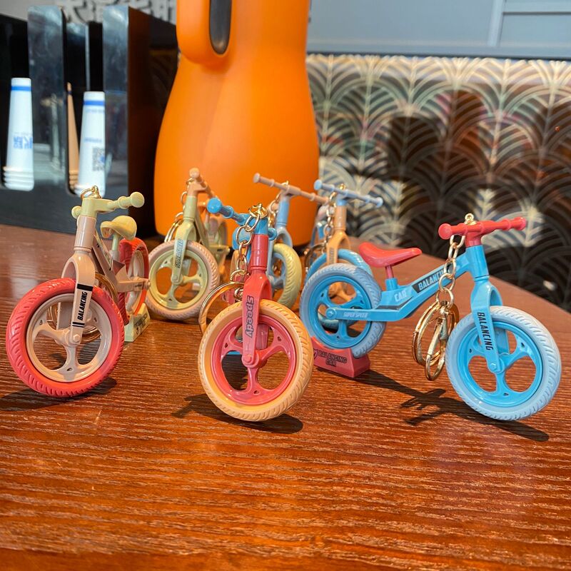 Creative Fun Fun movable sliding bicycle keychain couple car fashion cool ornaments small gifts wholesale