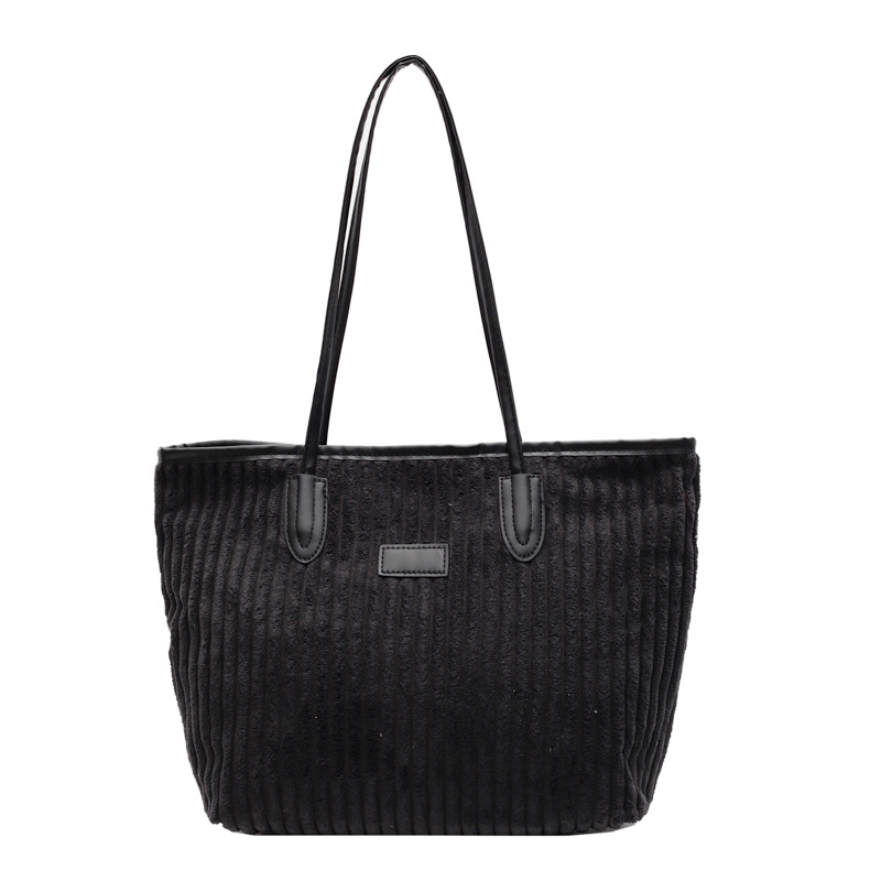 Verano 2024 invierno de gran capacidad de meandruño nuevo nicho simple de viaje de mano bolsa de hombro para mujeres