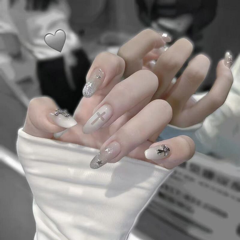 Sweet and cool style, milky white gradient with silver glitter stars, pure desire cross nail stickers, popular ins-style medium-long press-on nails