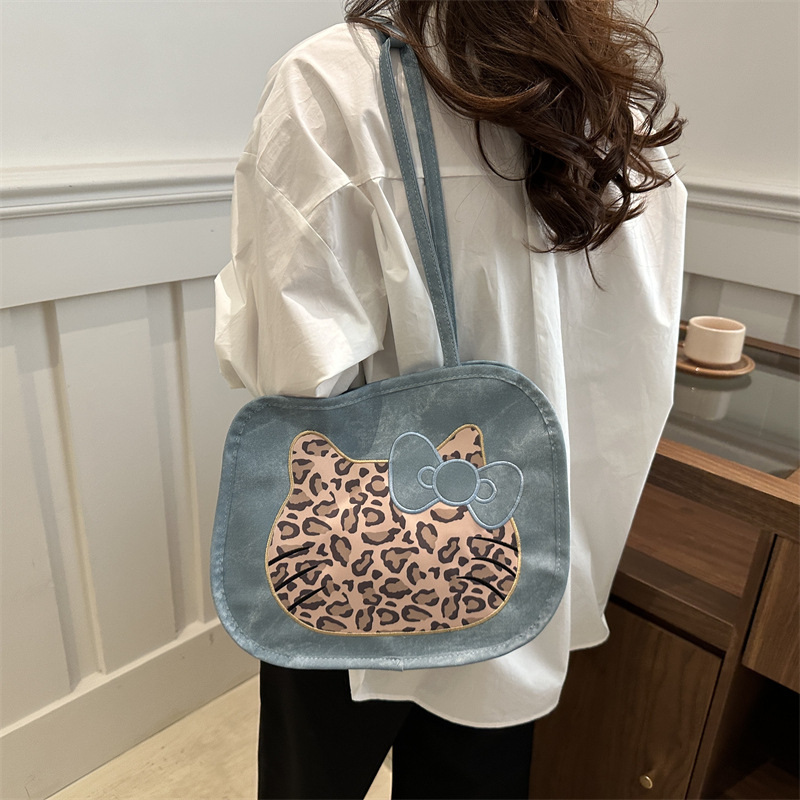 Honey Kitty Leopard empalme imitación jeans colorido simple multifuncional gran capacidad de un hombro mochila 2024 bolso de mujer