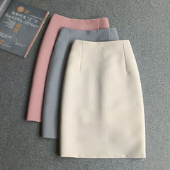 韓国版の修身スーツはお尻の半身のスカートの中のモデルの女性の春夏の新型の高い腰の純色の1歩のスカートの通勤するスカートを包みます。