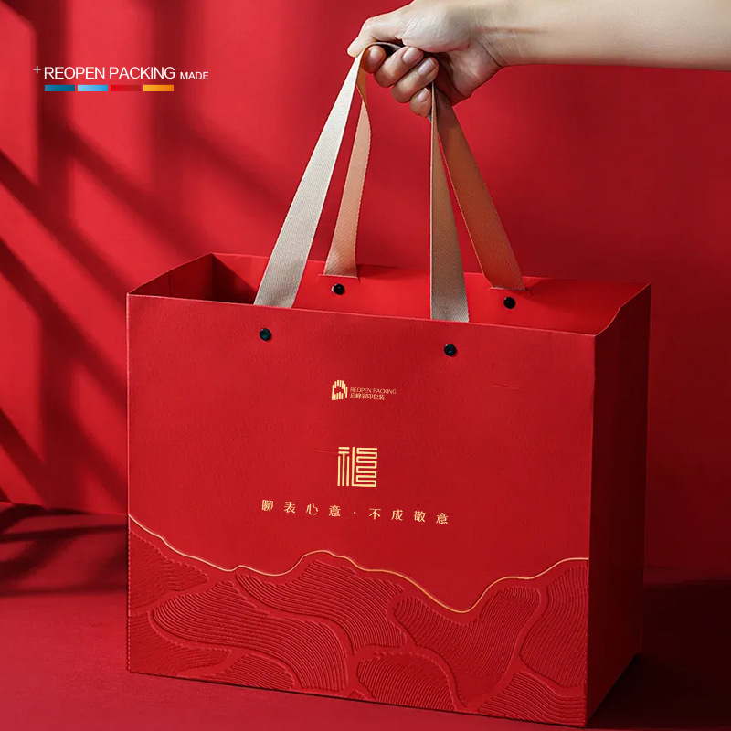 节日新年手提袋现货供应现货拿样定制logo茶叶手信手提袋 量大价