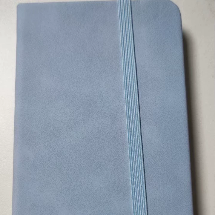 Waterproof A7 pocket notebook, portable mini journal with elastic closure