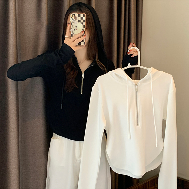 Selección estricta diseño de suéter de algodón sentido nicho primavera y verano cremallera corta superior adelgazante delgada manga larga con capucha ropa de mujer de estilo occidental