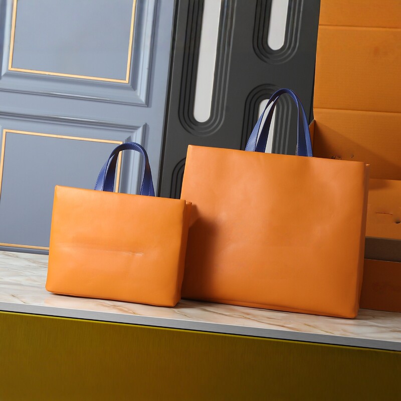 New Orange Genuine Leather Tote Bag, Large Capacity Handbag and Shoulder Bag for Women, Business Commuting, Simple and Fashionable Cowhide Bag New Orange Genuine Leather Tote Bag, Large Capacity Handbag and Shoulder Bag for Women, Business Commuting, Simple and Fashionable Cowhide Bag