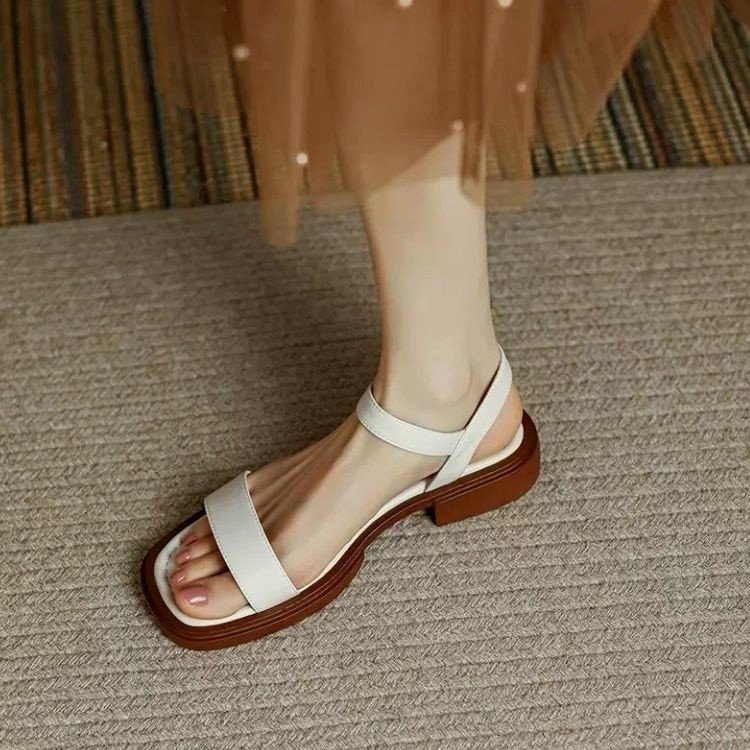 Explosiones cómodas y casuales transpirables con una base suave retro con sandalias para mujeres verano de 2026 nuevas sandalias romanas planas