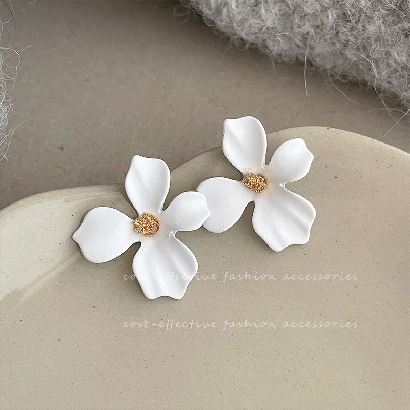 White earrings, flowered