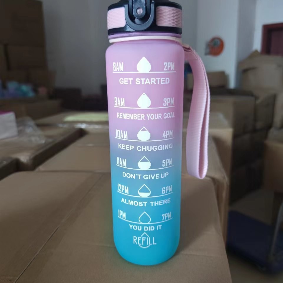 Fabricante en stock transfronterizo 1000ML caldera de rebote gradiente taza de agua escala portátil paja TRITAN taza deportiva