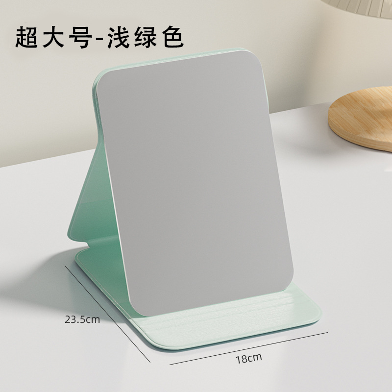 Espejo pequeño de escritorio de alto valor facial espejo de maquillaje plegable portátil dormitorio de estudiantes pequeño espejo cuadrado espejo doméstico unisex