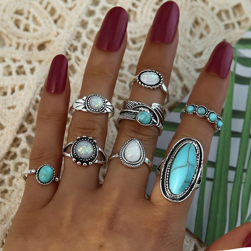 Retro Inlaid Turquoise Carved Feather Alloy Ring 8-piece Set display picture 3