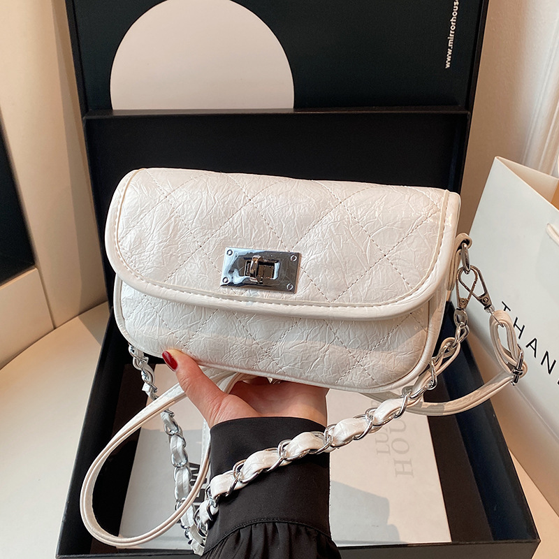 Bolso de cadena de rombos de fragancia pequeña de alta gama transfronteriza, bolso de mensajero de un solo hombro simple de moda, bolso de axila casual de todo fósforo para mujer