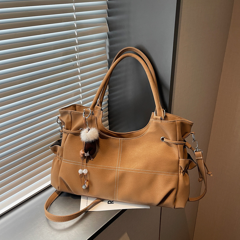 Retro nicho locomotora viento bolso otoño invierno 2025 nuevo sentido de alta calidad de viaje de hombro bajo la braza bolso de mujer