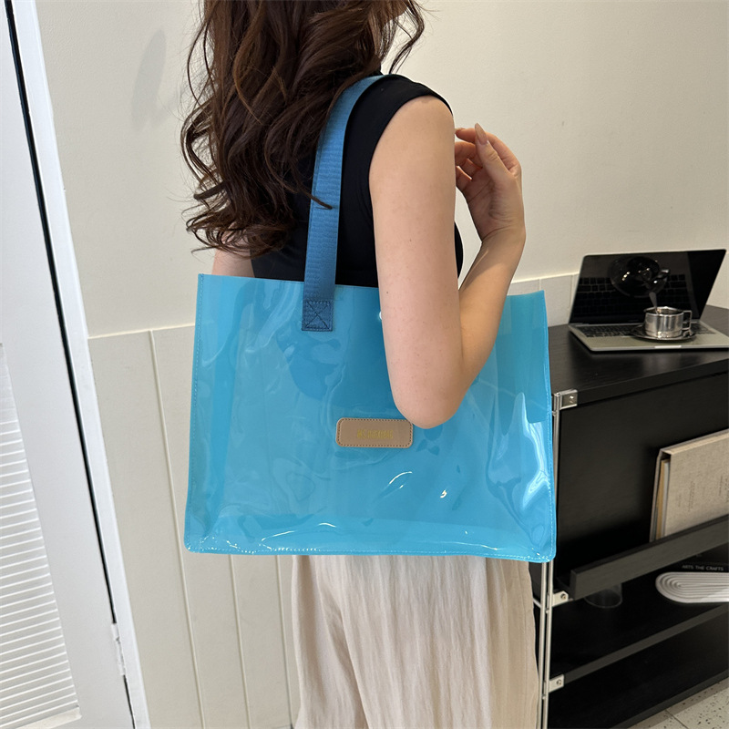 Este verano popular bolsa de jalea transparente de gran capacidad para mujeres 2024 nueva moda bolsa de plástico versátil