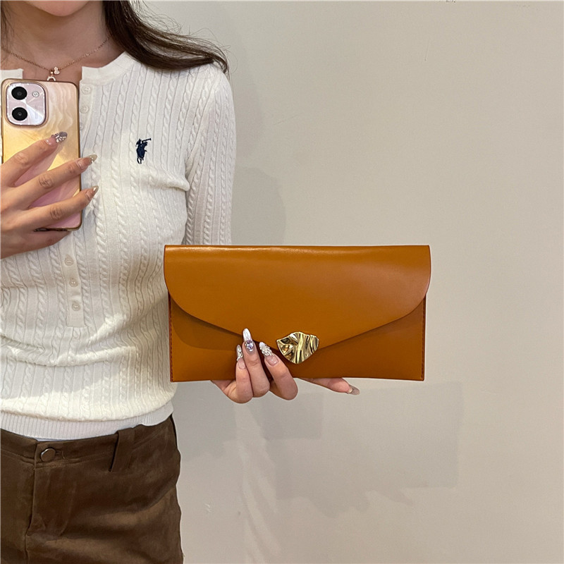 Commuting coreano ins alta sensación bolso de cena de moda casual nicho de diseño de color sólido bolso de mano universal