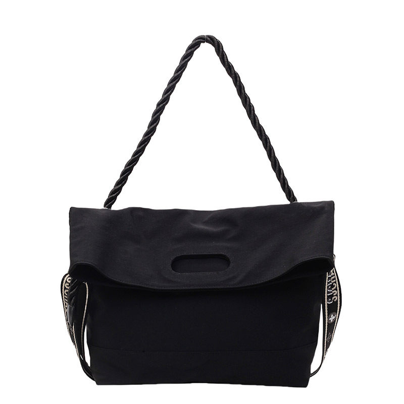 Bolso de tela de nylon de gran capacidad para mujeres 2025 verano nuevo estilo coreano simple mochila de hombro mochila de viaje casual