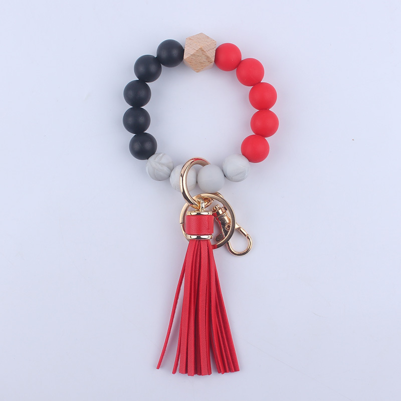 Nuevo cuero de LA PU corto Borla Llavero DIY de silicona de impresión de leopardo de color sólido con cuentas muñeca llavero colgante