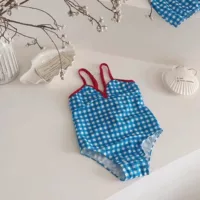 Baby Купальник 2025 новый иностранный стиль девушка летняя клетка шнуровка с открытыми плечами дизайн цельный купальник пляж