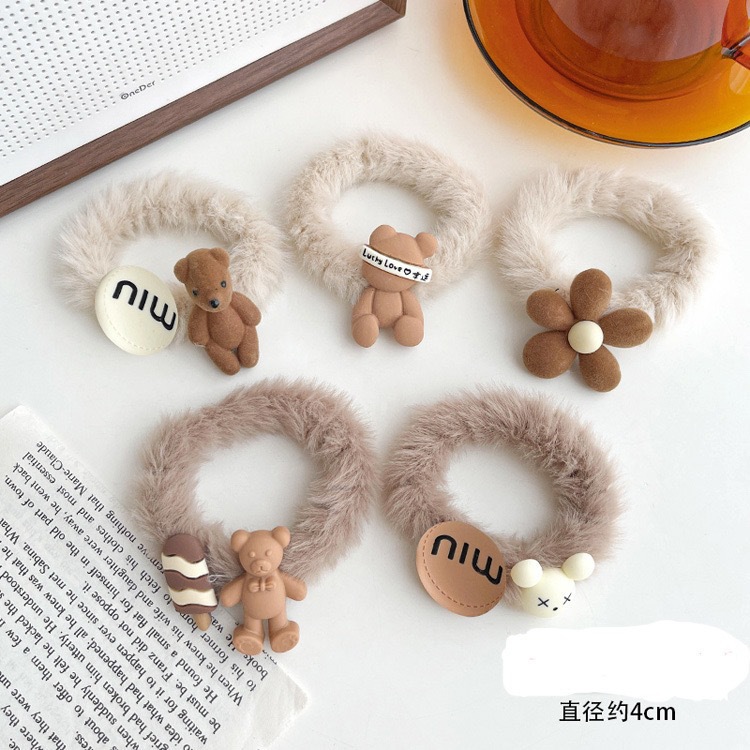 Otoño e Invierno nueva banda de pelo de peluche de dibujos animados leche marrón arco flor pelo cuerda traje Internet celebridad mismo estilo soporte generación pelo